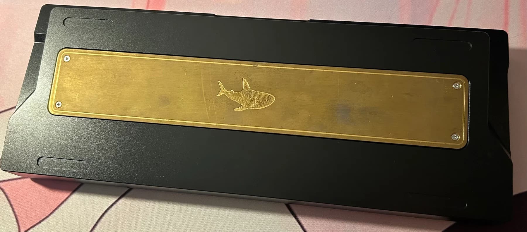 Brass Shark60 backplate engraved with a shark motif